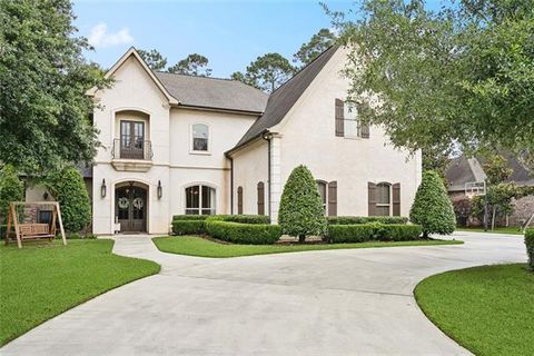 Photo of 205 Natchez Trace, Covington, LA 70433 (MLS # NO2548180)