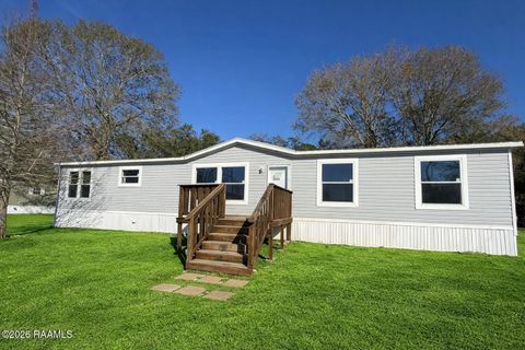 Photo of 1084 Huval Street, Breaux Bridge, LA 70517 (MLS # 2600000558)