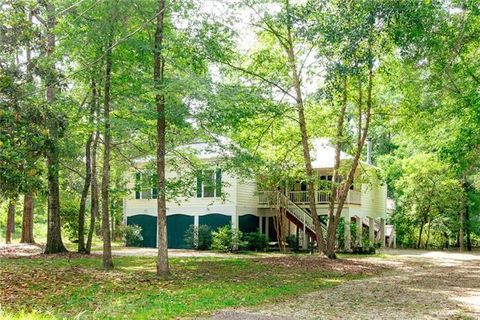 Photo of 150 Ponchitolawa Drive DR, Covington, LA 70433 (MLS # NO2555259)