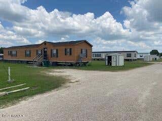 Photo of 1050 Osage Trail, Church Point, LA 70525 (MLS # 23011232)