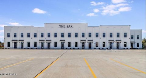 Photo of 711 E Main Street #100, Broussard, LA 70518 (MLS # 2500005939)