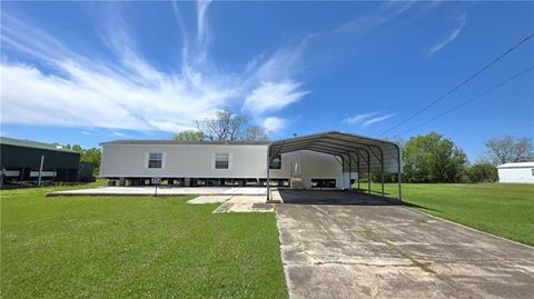 Photo of 712 Buras River Road, Buras, LA 70041 (MLS # NO2552348)