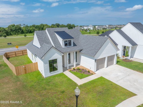 Photo of 119 Travellers Palm Way, Youngsville, LA 70592 (MLS # 2500003901)