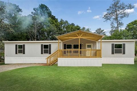 Photo of 20153 Garland Street St, Covington, LA 70435 (MLS # NO2554118)