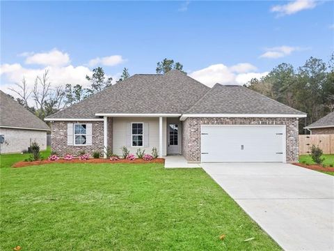 Photo of 72694 Robindale Drive Dr, Covington, LA 70435 (MLS # NO2549673)