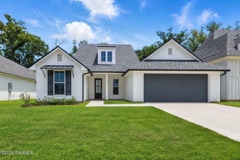 Photo of 611 Whispering Meadows Road, Broussard, LA 70518 (MLS # 2600007660)