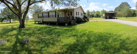 Photo of 310 Anicet Tauzin Road, Arnaudville, LA 70512 (MLS # 2600004324)