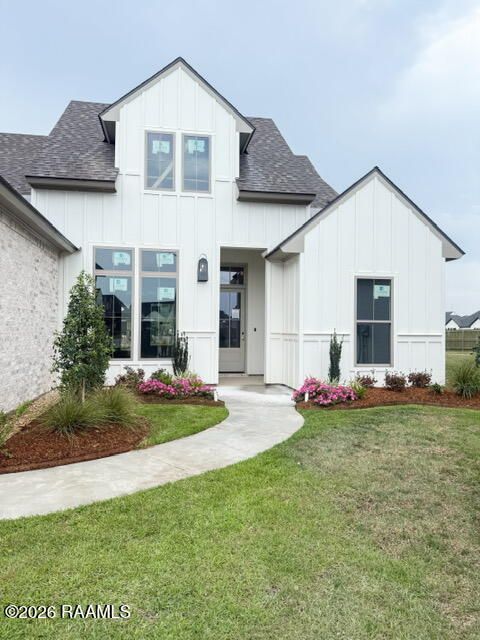 Photo of 108 Bruges Lane, Youngsville, LA 70592 (MLS # 2600003753)