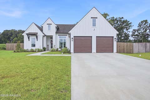Photo of 311 Benson Grove Dr, Youngsville, LA 70592 (MLS # 2600006889)