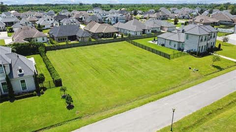 Photo of 324 Cypress Crossing Drive, Belle Chasse, LA 70037 (MLS # NO2570509)