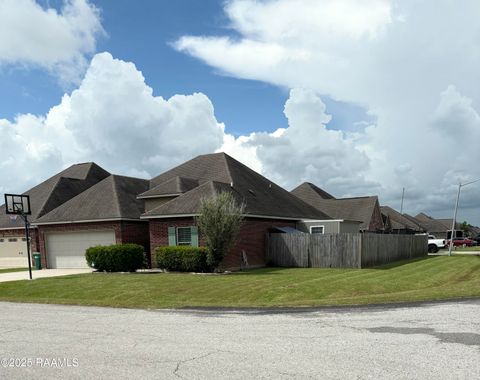 Photo of 205 Quiet Bluff Dr, Youngsville, LA 70592 (MLS # 2500003939)