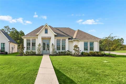 Photo of 7104 Green Heron Drive Dr, Madisonville, LA 70447 (MLS # NO2570982)