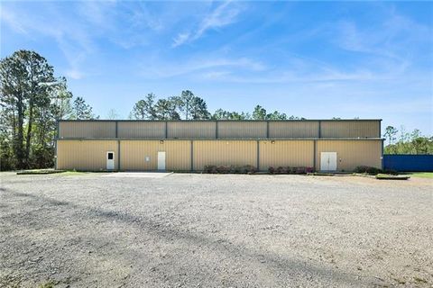 Photo of 70239 Caleb Lane Ln, Abita Springs, LA 70420 (MLS # NO2561226)