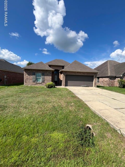 Photo of 303 Hill Ridge Drive, Youngsville, LA 70592 (MLS # 2600008501)