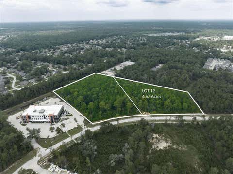 Photo of 0 Holiday Square Boulevard, Covington, LA 70433 (MLS # NO2413568)