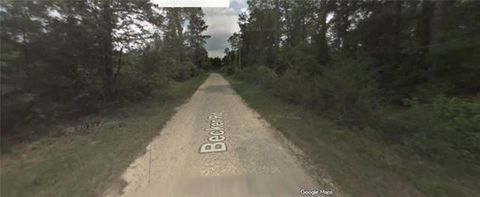 Photo of 74324 Becker Road Rd, Covington, LA 70435 (MLS # NO2566105)