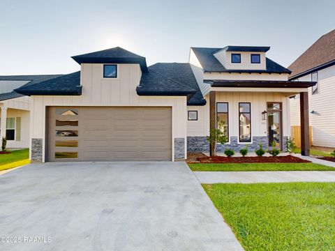 Photo of 102 Travellers Palm Way, Youngsville, LA 70592 (MLS # 24007009)