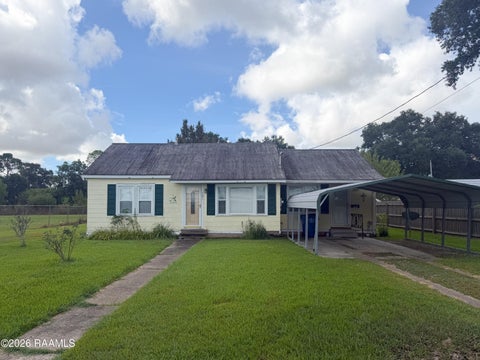Photo of 121 W Walnut Street, Crowley, LA 70526 (MLS # 2600007657)