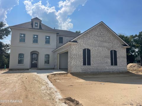Photo of 313 Benson Grove Drive, Youngsville, LA 70592 (MLS # 2500002797)