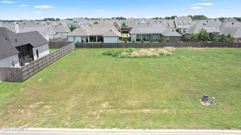 Photo of 401 Sunset Palm Court, Youngsville, LA 70592 (MLS # 2600005021)