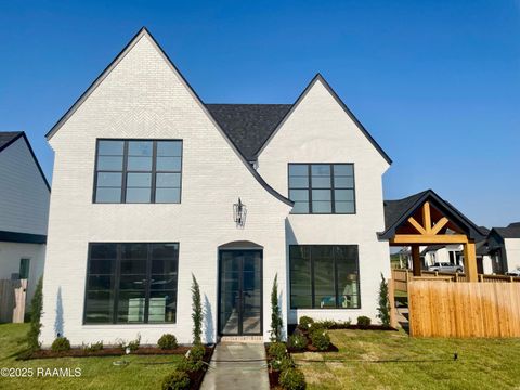 Photo of 100 Travellers Palm Way, Youngsville, LA 70592 (MLS # 2500003508)
