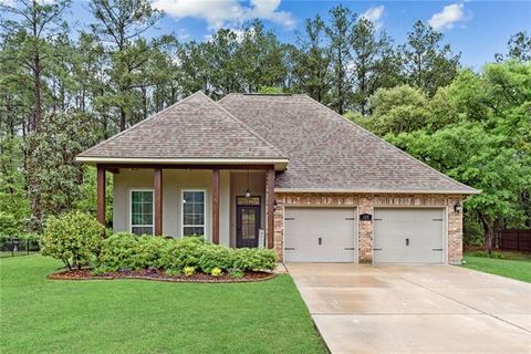 Photo of 125 Grand Lake Drive Dr, Covington, LA 70435 (MLS # NO2548222)
