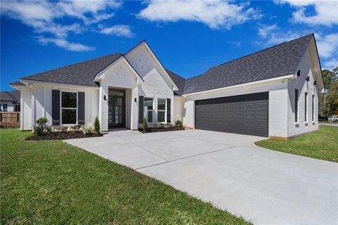 Photo of 1073 Abita River Drive Dr, Covington, LA 70433 (MLS # NO2547930)