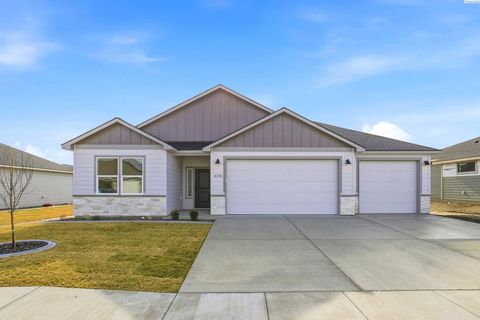 Photo of 8718 Dusty Maiden Dr, Pasco, WA 99301 (MLS # 288907)
