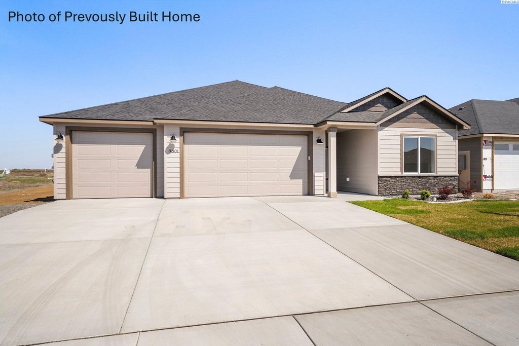 Photo of 8718 Dusty Maiden Dr, Pasco, WA 99301 (MLS # 288907)