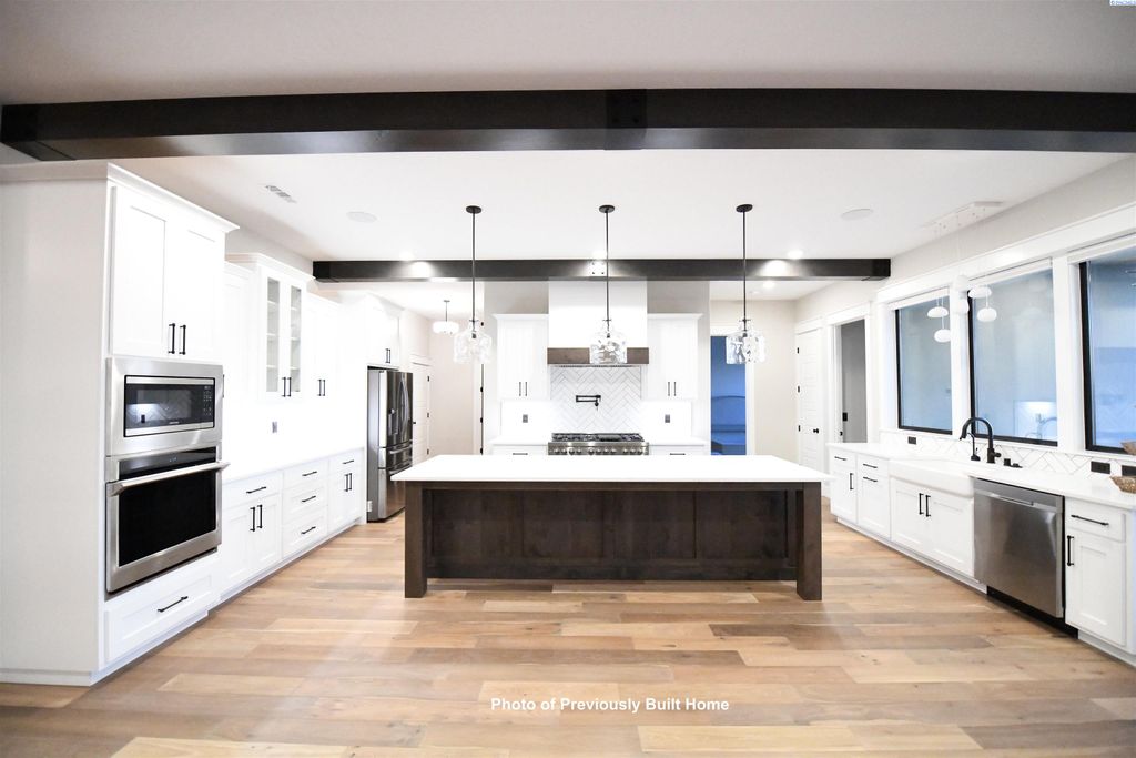 Photo of 8217 Concord Crest Ln, Pasco, WA 99301 (MLS # 288439)