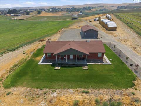 Photo of 200115 E Game Farm Rd, Kennewick, WA 99337 (MLS # 295201)