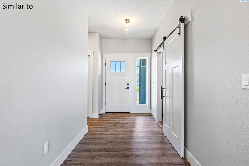 Photo of 987 Miraflores Ave, West Richland, WA 99353 (MLS # 289544)