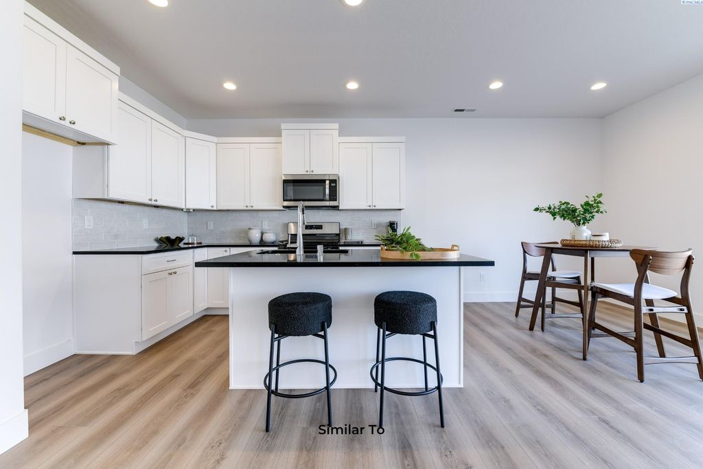 Photo of 10442 Clearwater Dr, Kennewick, WA 99336 (MLS # 291363)