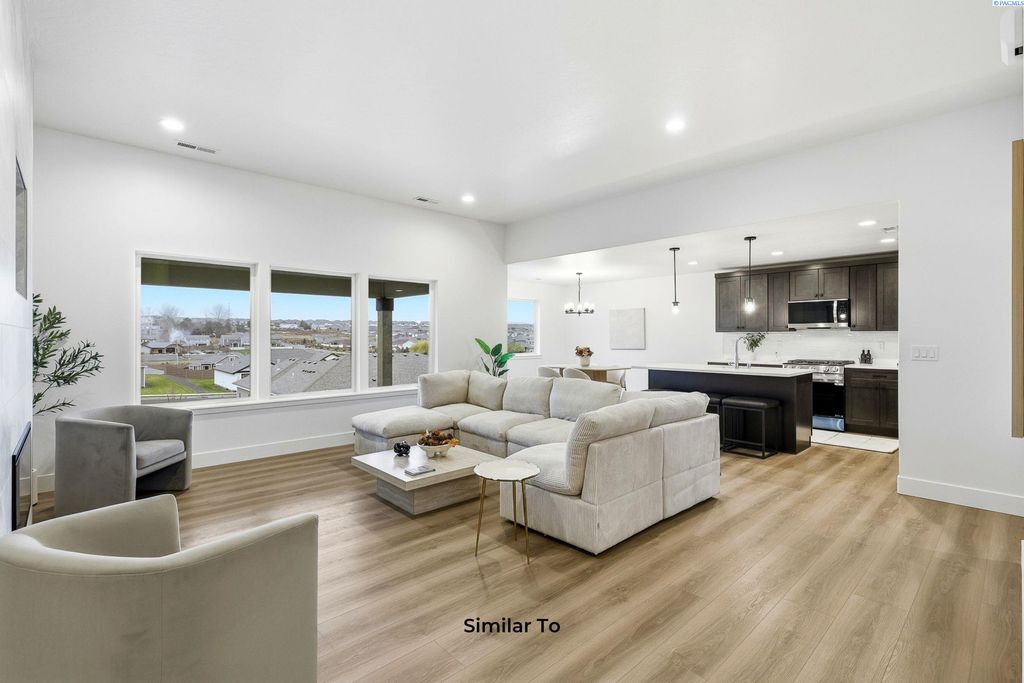 Photo of 10015 Redbud Dr (Phase 1 Lot 20), Pasco, WA 99301 (MLS # 291763)