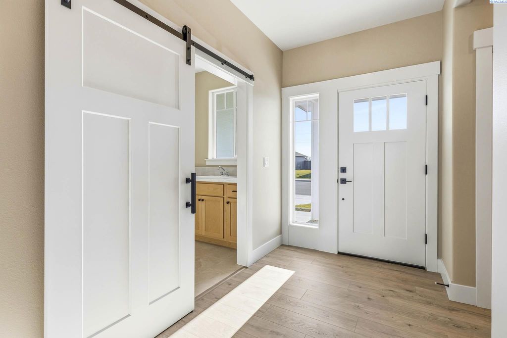 Photo of 8717 Silver Mound Dr, Pasco, WA 99301 (MLS # 289558)