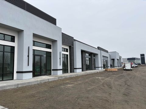 Photo of 9707 St Thomas Dr #E, Pasco, WA 99301 (MLS # 290265)