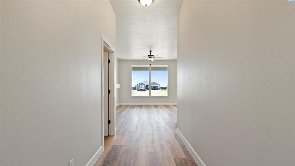 Photo of 8809 Dusty Maiden Dr, Pasco, WA 99301 (MLS # 292738)
