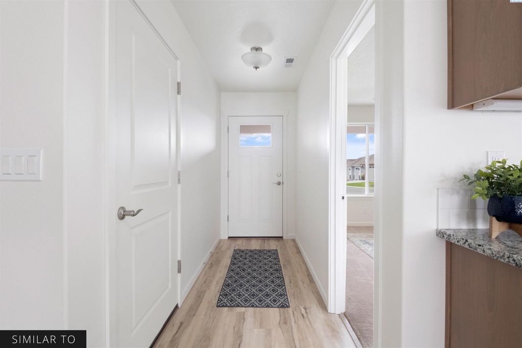 Photo of 7069 W 38th Ave, Kennewick, WA 99338 (MLS # 289770)