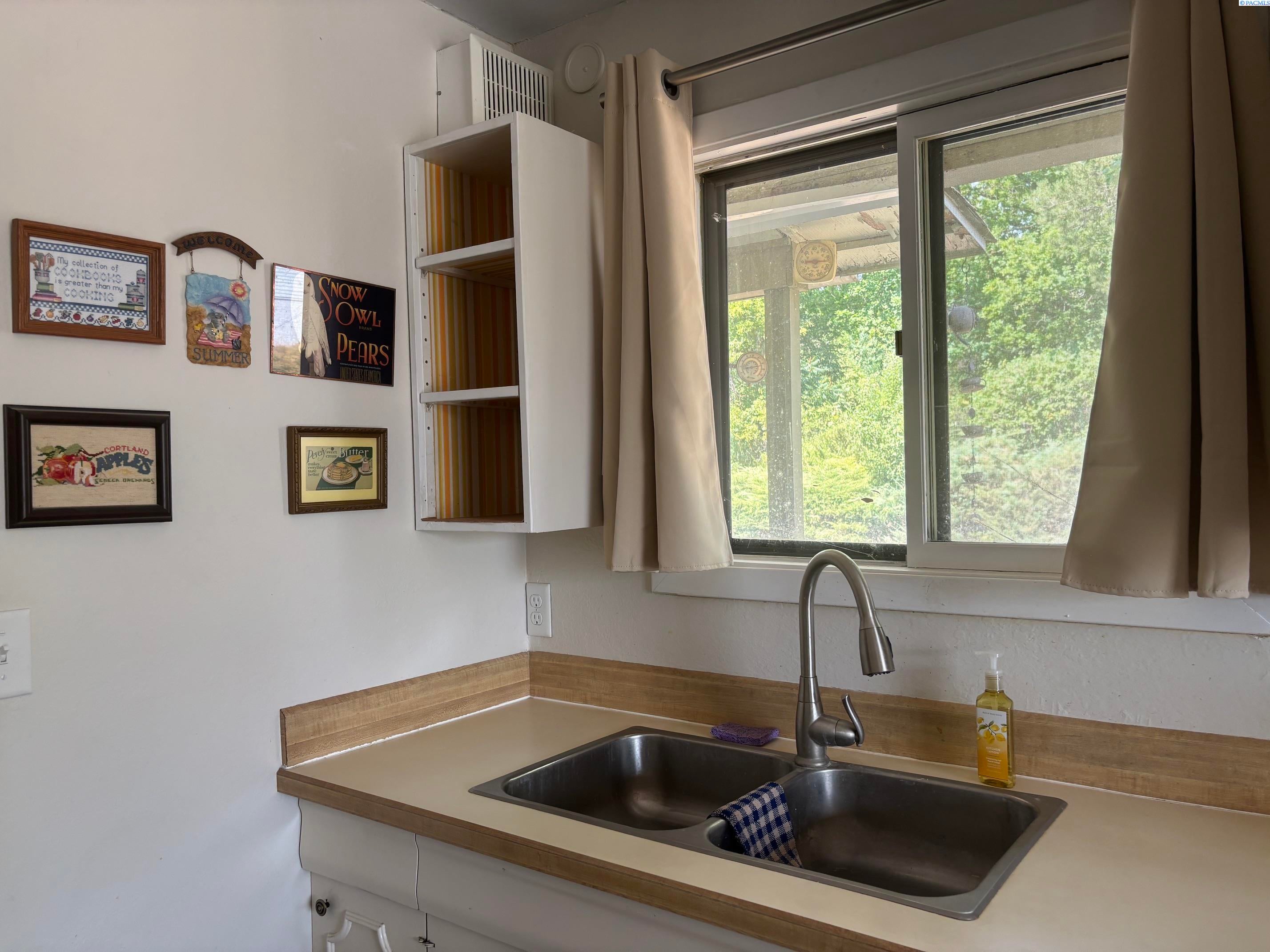 IDX 3 405 NW Dack Ct