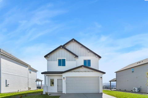 Photo of 727 Honeylicious St, Richland, WA 99352 (MLS # 297277)