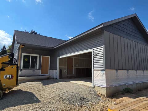 Photo of 29 Rock River Drive, Edgerton, WI 53589 (MLS # 2026130)