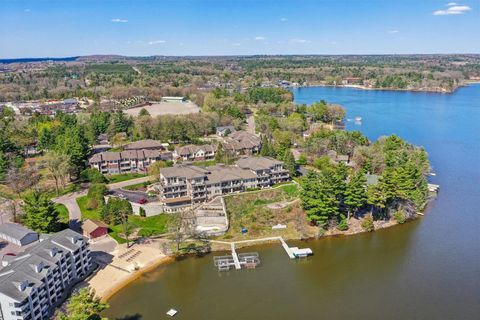 Photo of 670 E Lake Avenue 202 #202, Wisconsin Dells, WI 53940 (MLS # 1999415)