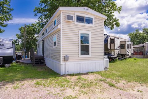 Photo of Lot 74 Pine Cove Resort, New Lisbon, WI 53950 (MLS # 2027820)