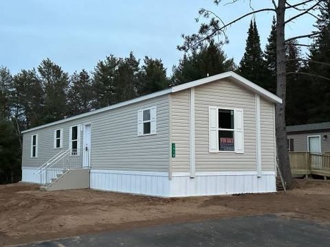 Photo of 1410 Arbor Vitae Lane, Woodruff, WI 54568 (MLS # 2014878)