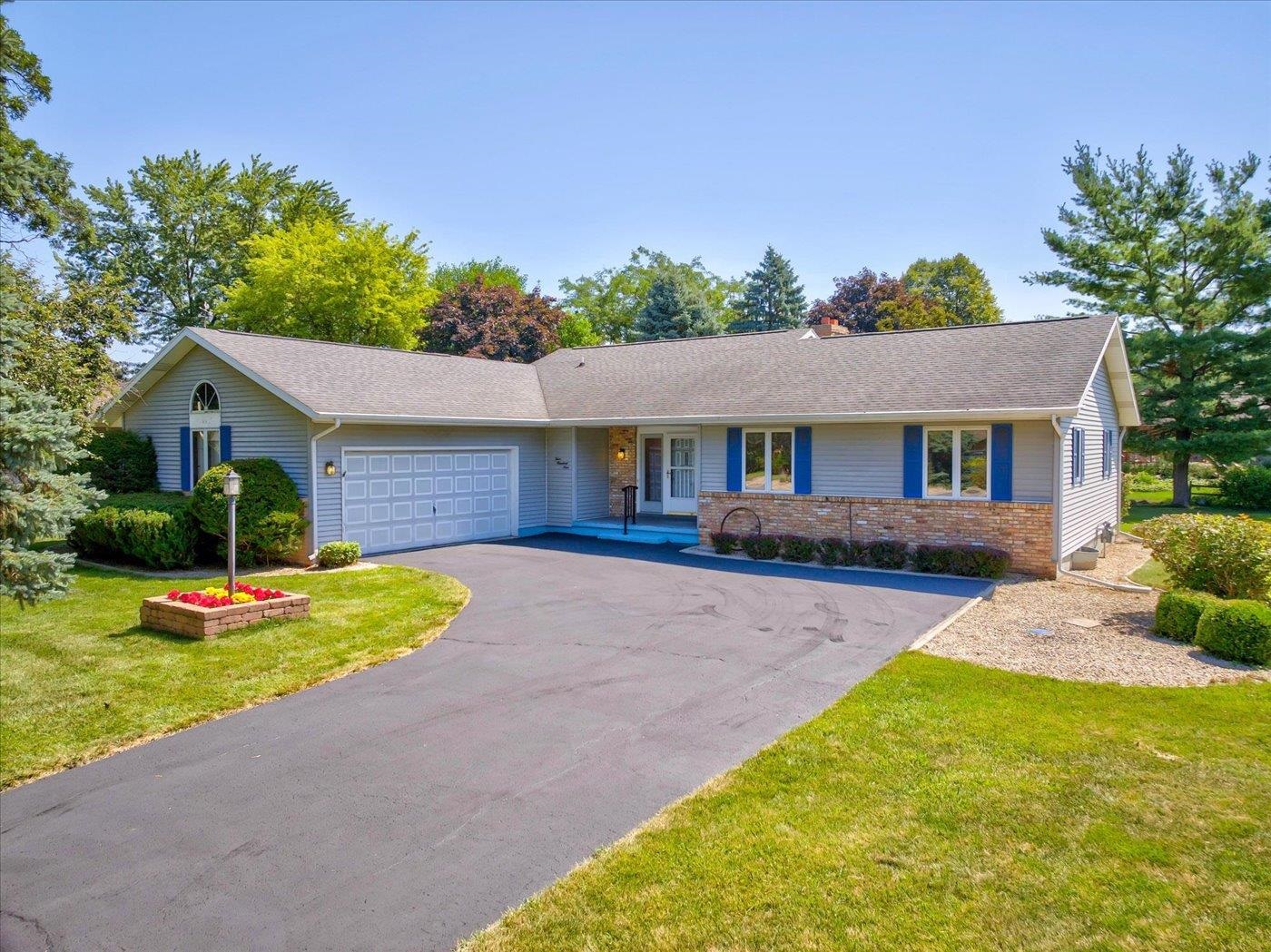 Photo 1 of 58 — 409 Riverwood Bend, DeForest, WI 53532