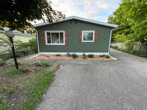 Photo of 75 Falling Creek Circle 75 #75, Janesville, WI 53548 (MLS # 2014183)