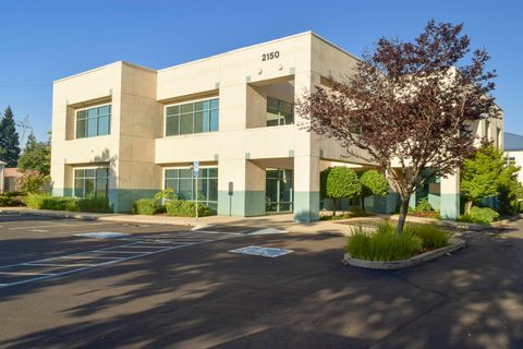 Photo of 2150 Churn Crk Road #100, Redding, CA 96002 (MLS # 26-849)