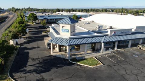 Photo of 555 E Cypress Avenue, Redding, CA 96002 (MLS # 24-120)