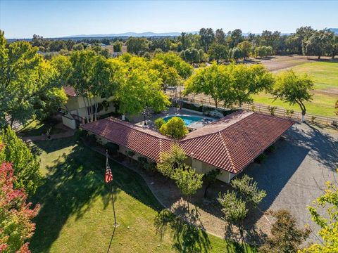 Photo of 5521 Churn Crk Road, Redding, CA 96002 (MLS # 25-4836)