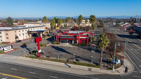 Photo of 1987 Hilltop Drive, Redding, CA 96002 (MLS # 25-5390)